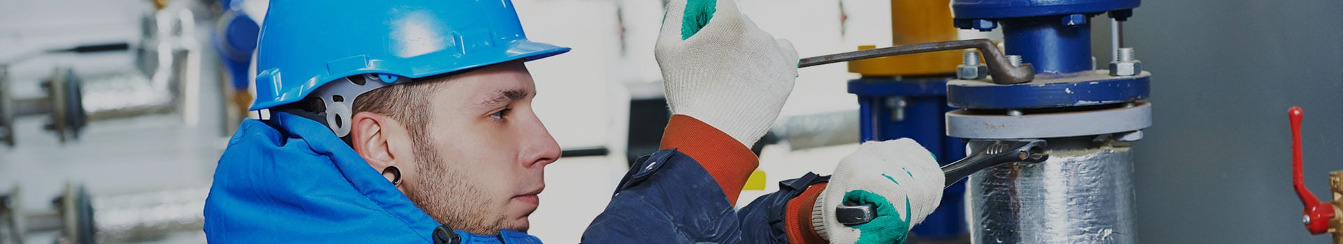Professional plumber repairing a leaking pipe in Richmond Hill