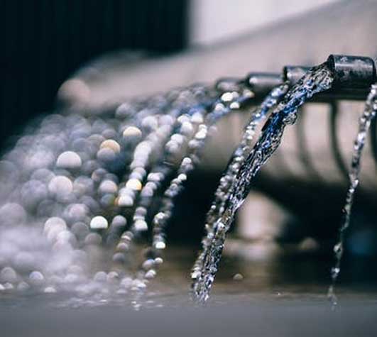 A professional plumber repairing a leaking pipe in Richmond Hill using advanced tools and techniques to ensure a lasting fix.